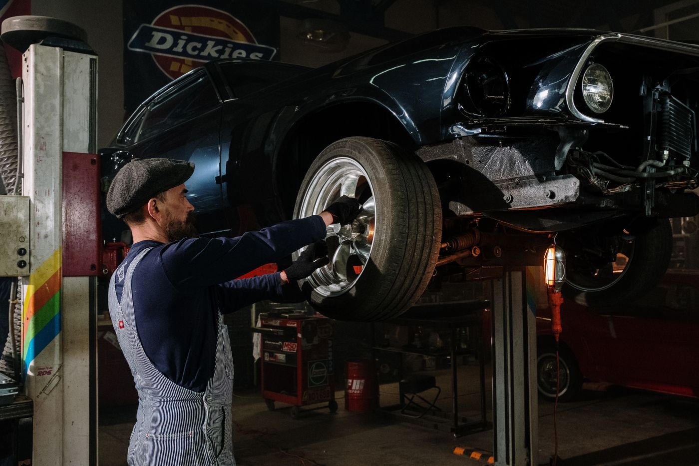 Mechanic inspecting a vehicle