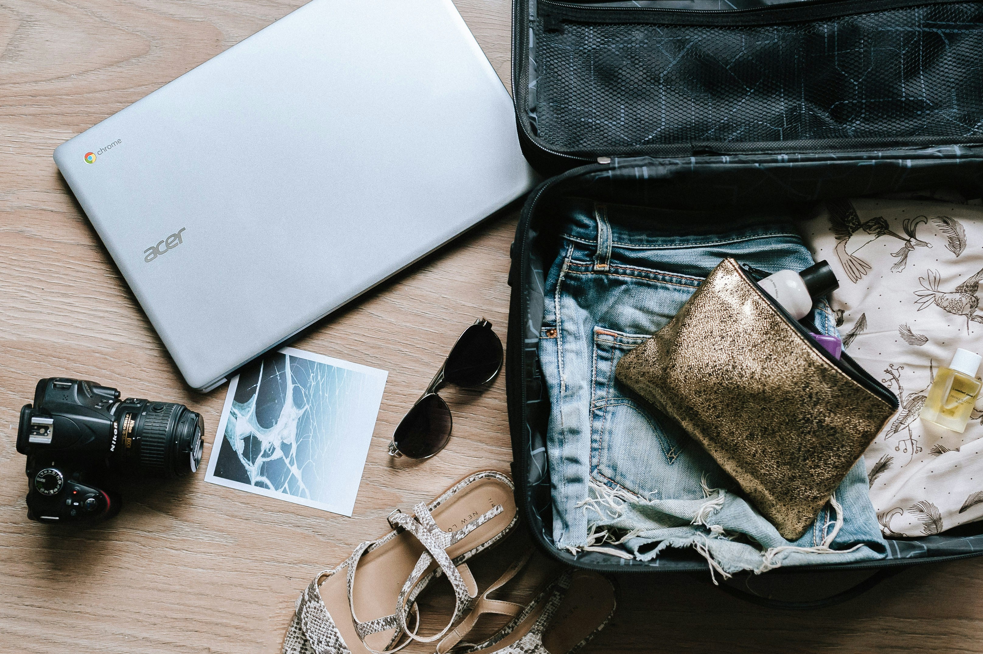 Open suitcase organized for travel